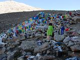 46 Prayer Flags And Pilgrim Clothing On Shiva Tsal On Mount Kailash Outer Kora Shiva Tsal (5371m) is a rocky expanse dotted with stone cairns draped with items of clothing. Pilgrims are supposed to undergo a symbolic death at this point, leaving their old life behind along with an item of clothing to represent it, a drop of blood or a lock of hair.